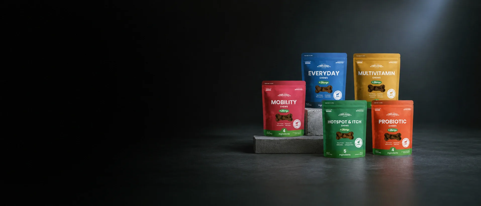 Feel Good Pet Co. chew packaging arranged on concrete blocks