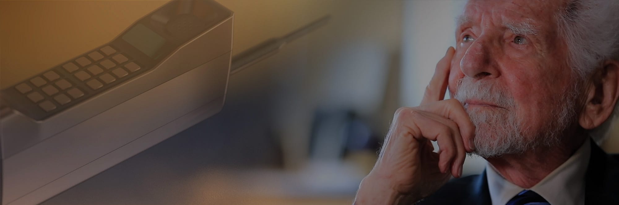 Motorola 50th anniversary header with vintage and modern phones showing a Martin Cooper call